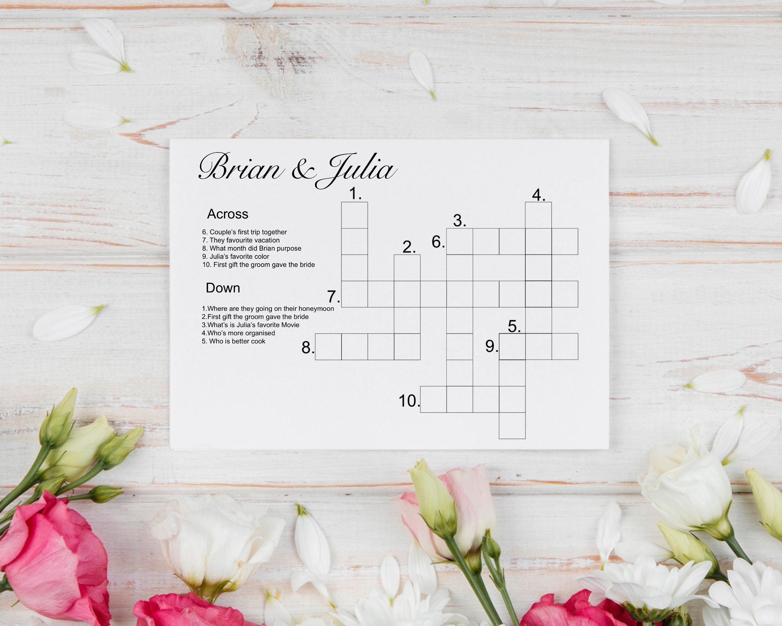 A Crossword Puzzle With Pink And White Flowers